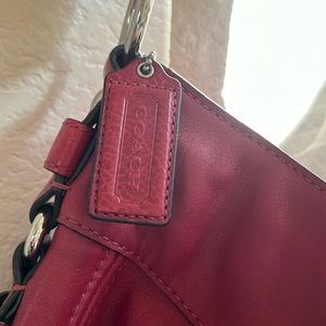 Beautiful rich red Coach purses.  In EUC, has three inside side pockets.